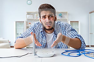 The frustrated young man due to weak internet reception