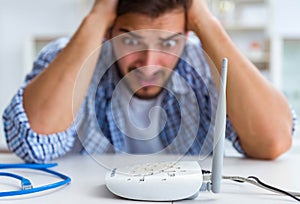 Frustrated young man due to weak internet reception