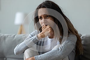 Frustrated young mixed race girl feeling desperately.