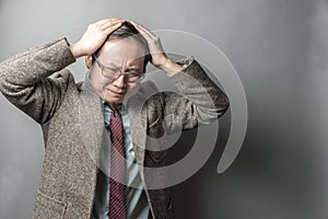 Frustrating Asian Businessman photo