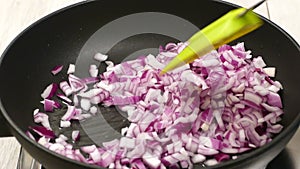 Fry onion and vegetables in the pan