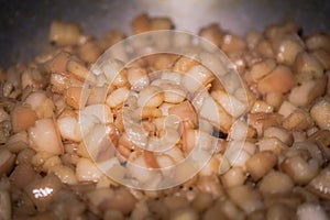 Fry the pork skin in a large frying pan