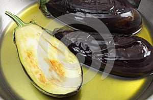 Frying aubergines in olive oil