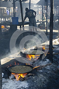 Frying fish at fish market