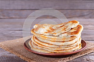 Frying flatbread filled with cheese