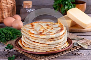 Frying flatbread filled with cheese