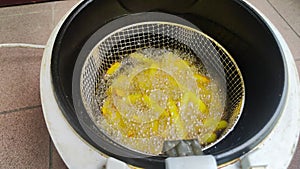 Frying french fries in fryer