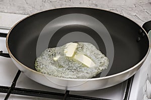 Frying pan with butter