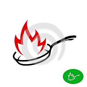 Frying pan with fire flame logo. photo