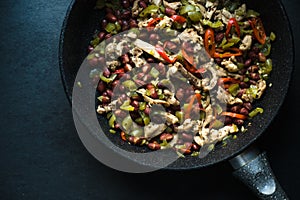 Frying pan with ready fajita top view. Mexican cuisine.