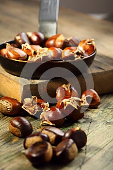 Frying pan and roast chestnuts.