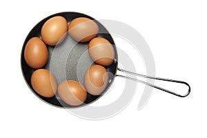 Frying pan with seven eggs