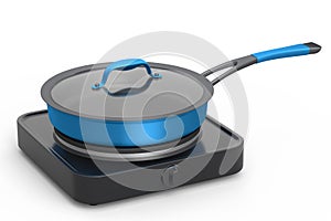 Frying pan or wok with glass lid on portable camping electric stove