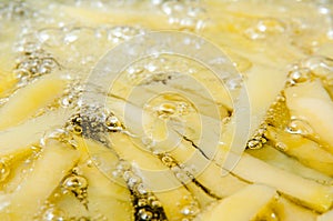 Frying potatoes in oil