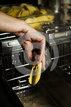 Frying potatoes in a professional kitchen