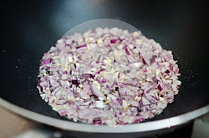 Frying red onion