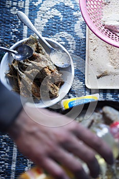 Frying small sardines fish, Chefchouen, Morocco photo