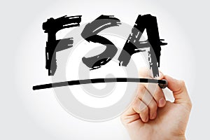 FSA - Financial Services Authority acronym with marker, business concept background