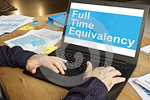 FTE full-time equivalency is shown on the conceptual business photo