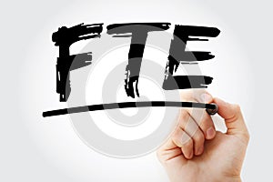 FTE - Full Time Equivalent acronym with marker, business concept background