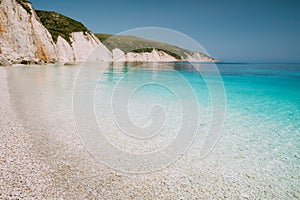 Fteri beach in Kefalonia Island, Greece. One of the most beautiful untouched pebble beach with pure azure emerald sea