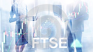 FTSE 100 Financial Times Stock Exchange Index United Kingdom UK England Investment Trading concept with chart and graphs