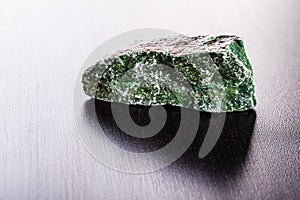 Fuchsite stone on wood