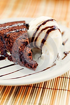 Fudge cake with vanilla ice cream