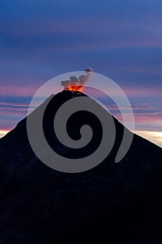 Fuego Volcano eruption during night with lava and fire rocks, view from volcano Acatenango, Guatemala