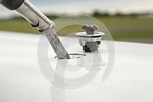 Fuel nozzle filling up aircraft