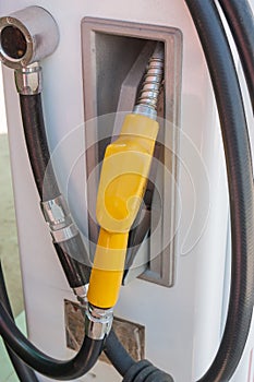 Fuel nozzle at a gas station.