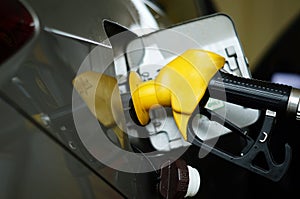 Fuel nozzle inside the fuel tank hoper photo