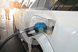 Fuel nozzle to refill fuel in car at gas oil station