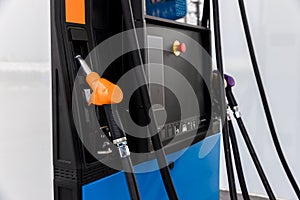 Fuel Pump, Gas Station, Gasoline. Colorful Petrol pump filling nozzles . Gas station in a service Head fuel vehicle refueling faci