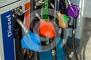 Fuel Pump, Gas Station, Gasoline.Colorful Petrol pump filling nozzles isolated on white background , Gas station in a service in w