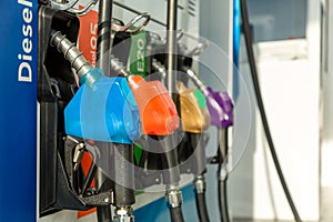 Fuel Pump, Gas Station, Gasoline.Colorful Petrol pump filling nozzles  on white background , Gas station in a service in w