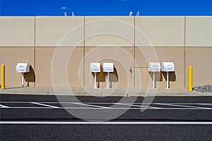 Fuel pump outlets on the exterior wall of an industrial building
