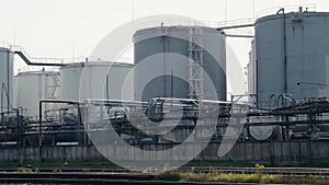 Fuel storage tanks. Capacities at the modern industrial enterprise. Industrial scene