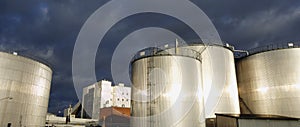 Fuel storage tanks at sunset