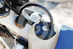 Fuel tank cap of ATV car close up.