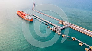 Fuel tanker ship loading in port view from above, Tanker ship logistic import export business and transportation, Aerial view