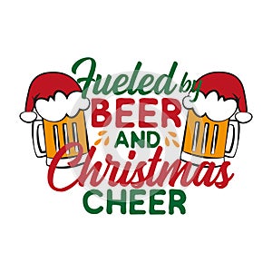 Fueled by beer and Christmas cheer - funny text , with Santa`s cap on beer mug. photo
