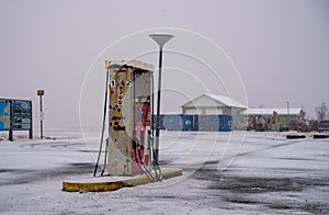Fuelling gas and petrol station on an icy road in Iceland