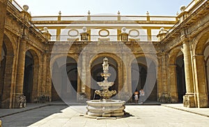 Fuente barroca en el interior de la Real FÃÂ¡brica de Tabacos de Sevilla, AndalucÃÂ­a, EspaÃÂ±a. photo