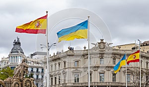 Fuente de Cibeles with Spanish and Ukrainian Flags photo