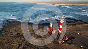 Fuerteventura . Canary island, El Cotilio village. El Toston lighthouse aerial video