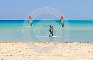 Fuerteventura , Canary island 08 June 2017 : A man is enjoying windsurfing. it is necessary to learn using a surf school