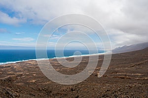 Fuerteventura, Canary Islands, Spain. Beautiful landscape of mountains, beach and coast of Atlantic Ocean