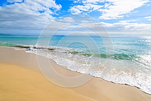 Ocean wave on tropical sandy Jandia beach, Morro Jable, Fuerteventura, Canary Islands, Spain