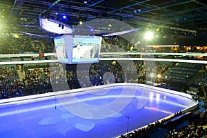 Fugure skating and hockey stadium with spectators.